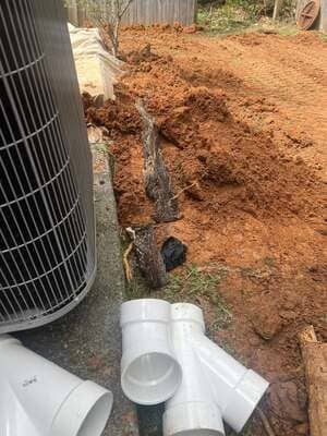 Exposed underground sewer pipe